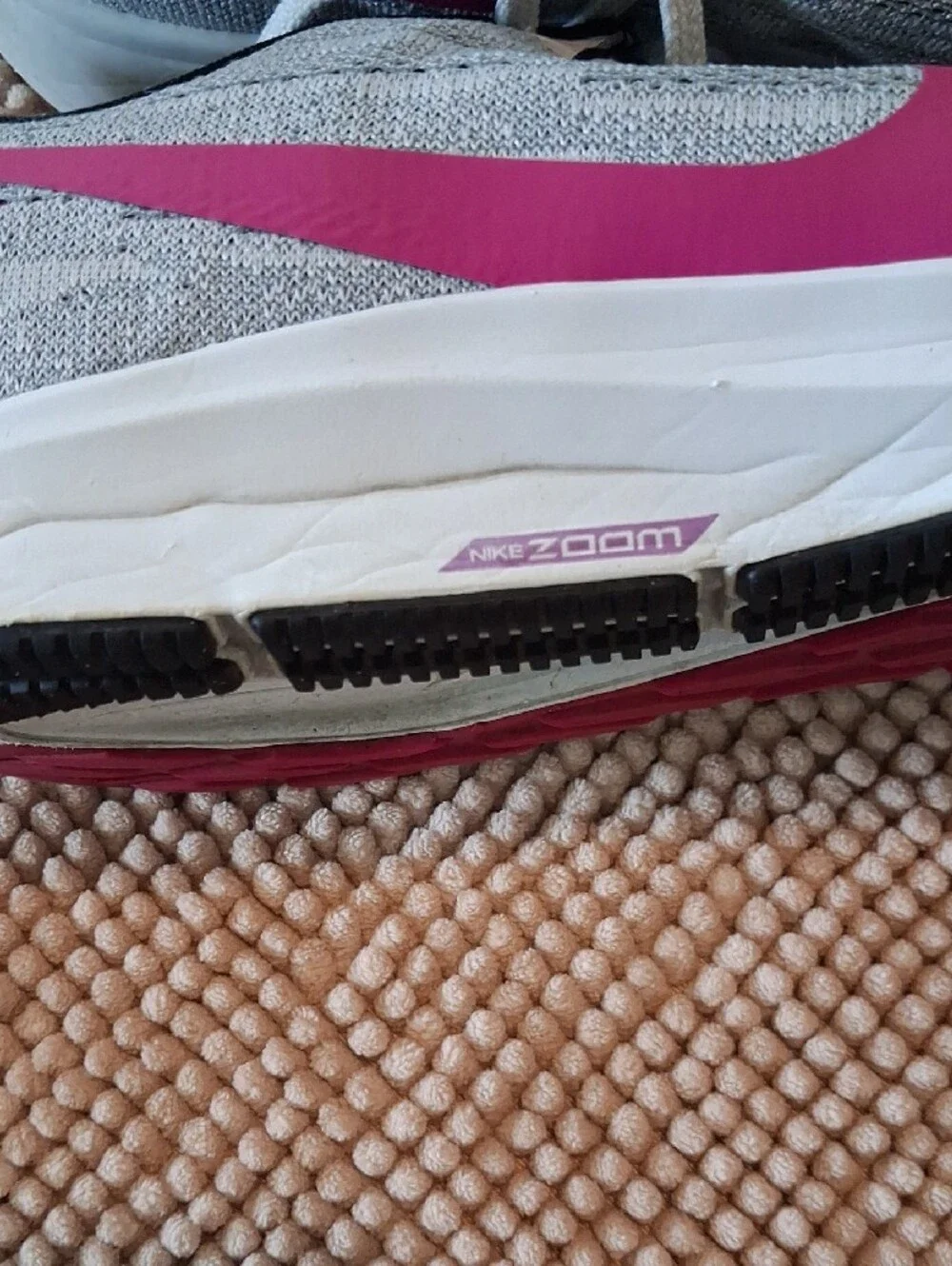 Nike Gray Athletic Running Shoes with Pink Swoosh